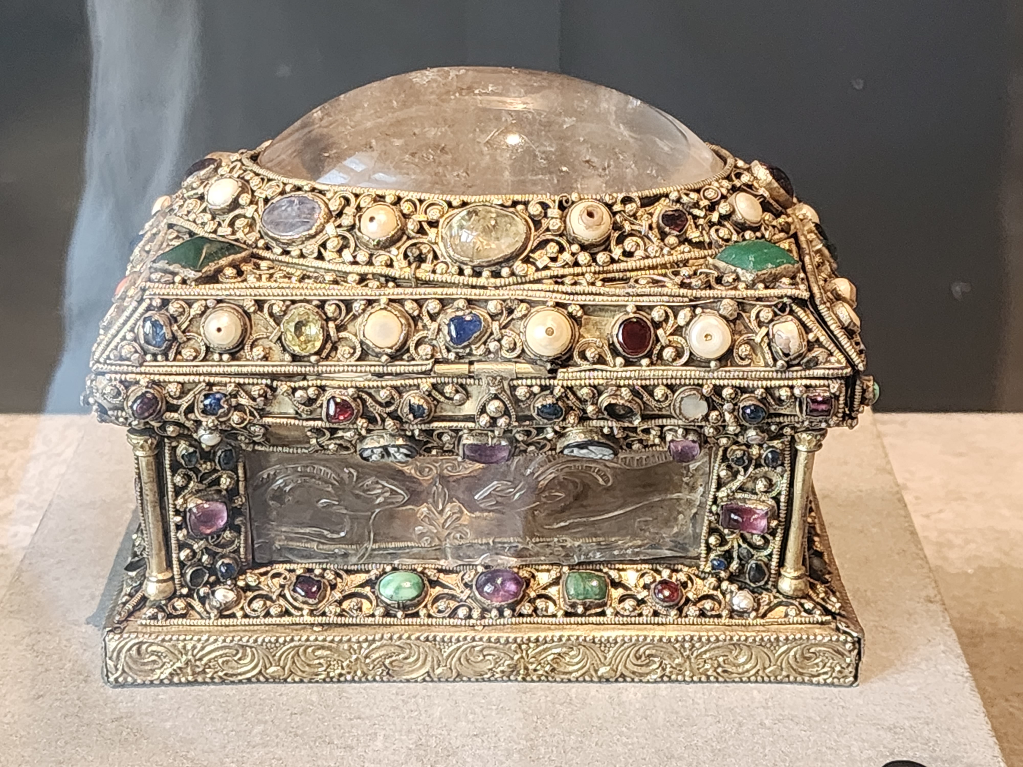 Small box reliquary ornately decorated with gems and crystal